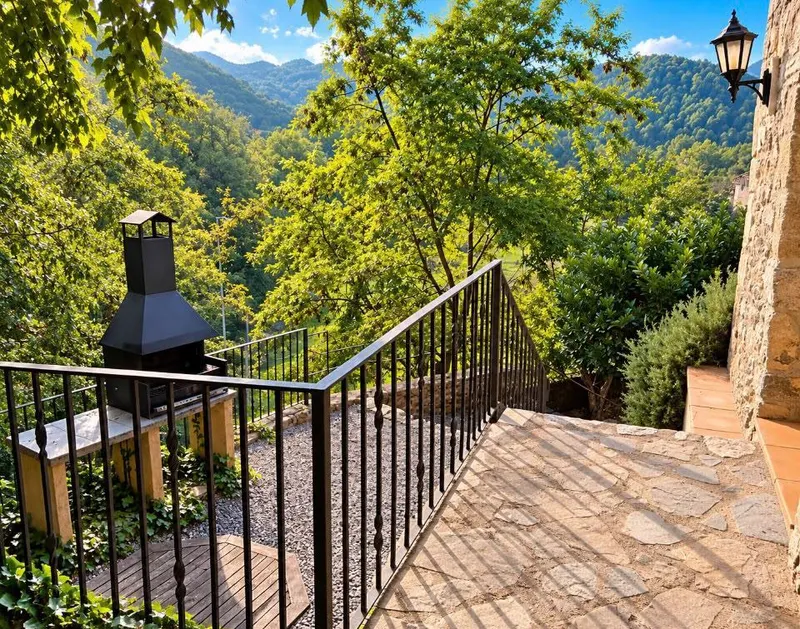 Built-in barbecue and a railed path among trees