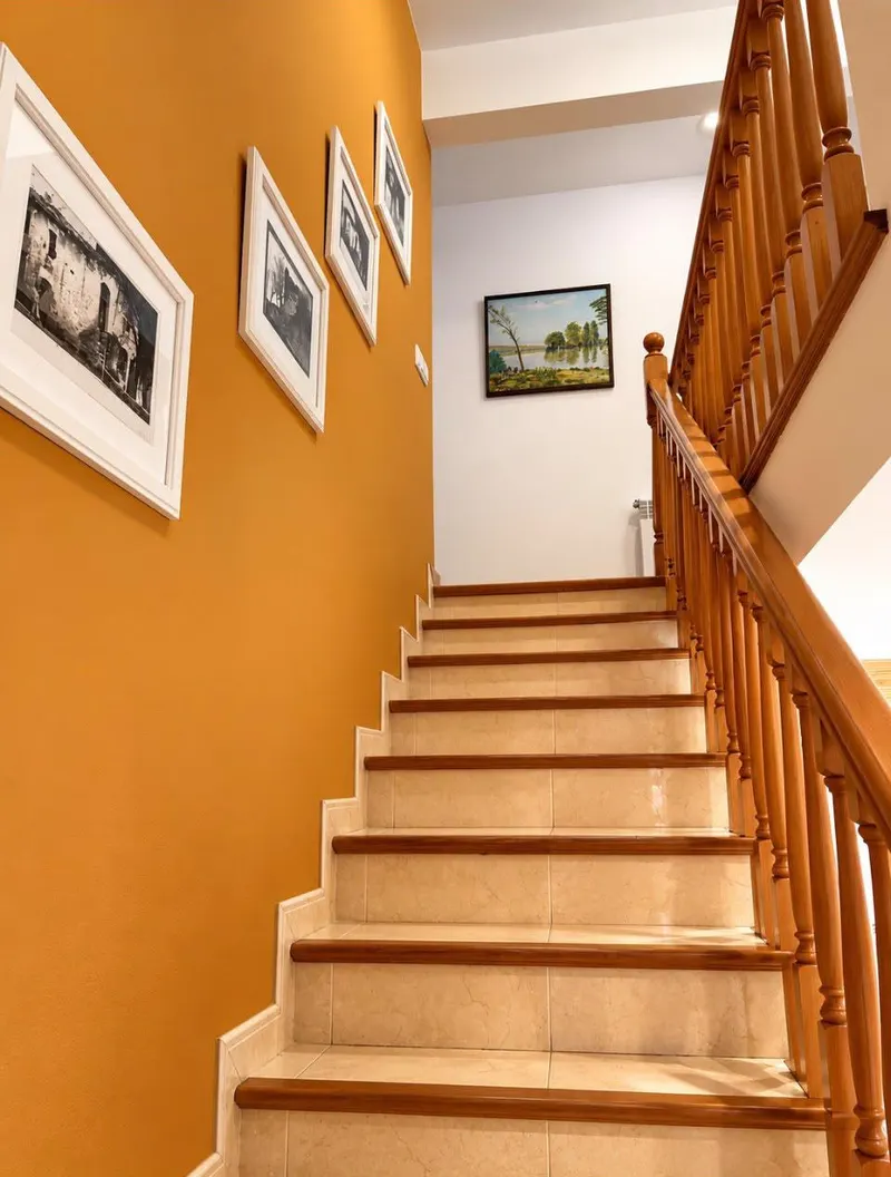 Wooden interior staircase between floors