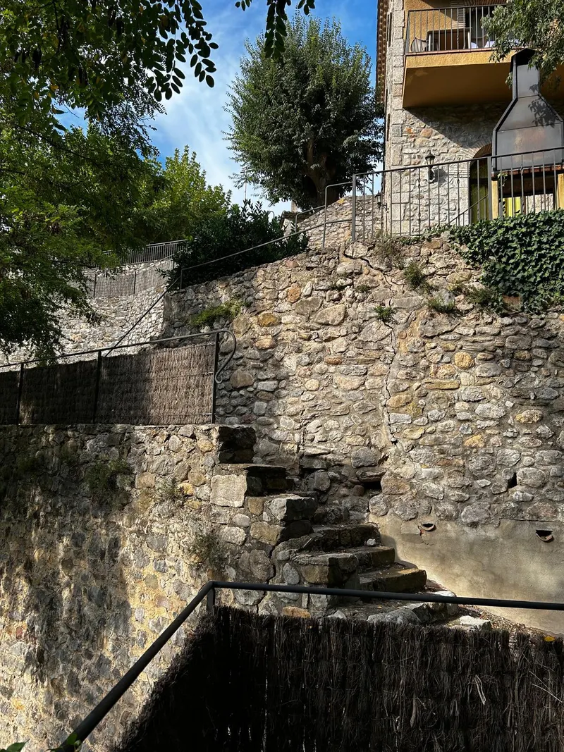 Stone steps beside a dry-stone wall